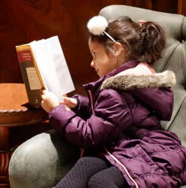 Child reading a book