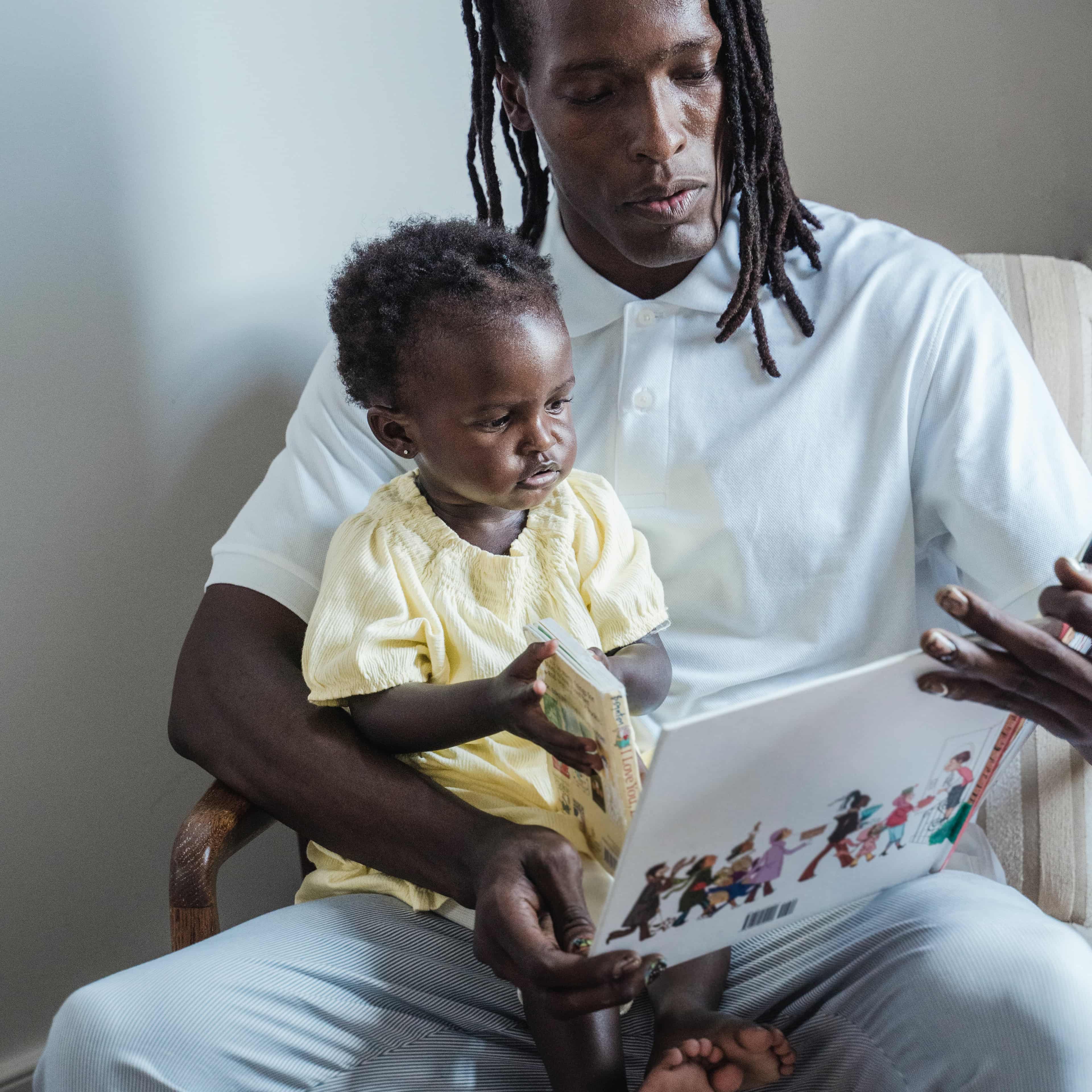 Father reading to child